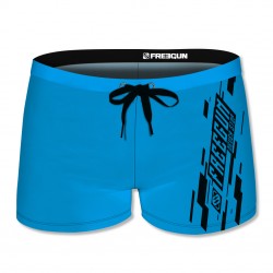 Boxer de bain garçon uni avec logo rubber print noir